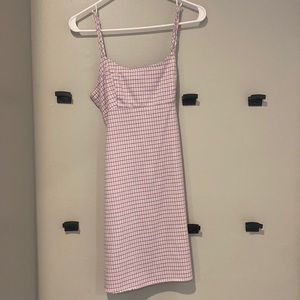 Cute purple and white plaid dress with tie in the back from Brandy Melville.